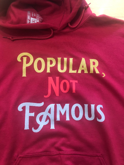 Pullover Style Graphic Hoodie w/ “Popular Not Famous” Design