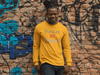 Pop Savvee Clothing Shirts S / Gold / Combed/Ringspun Cotton Unisex Long Sleeve Crewneck T-Shirt With “Popular Not Famous” Logo
