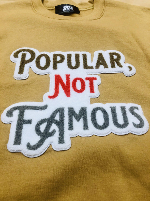 Pop Savvee Clothing Sweatshirts S / Old Gold / Cotton/Polyester Old Gold Unisex Sweatshirt With “Popular Not Famous” Chenille Embroidery